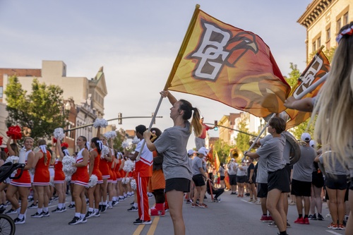 BGSU Band member waves BGSU flag during Rally BG event