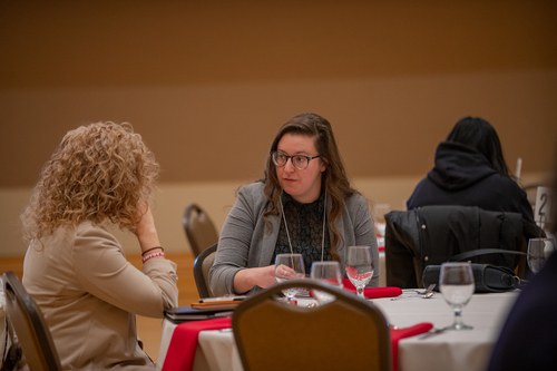 Keynote Luncheon Attendees Discussing 