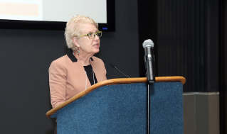 Marcia Salazar Valentine, Executive Director, BGSU’s International Programs & Partnerships presenting the Bienvenida/Bem-vinda