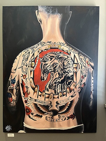 A painting of a man's back with a large tattoo