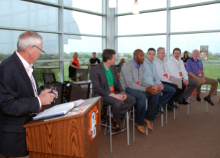 Dick Maxwell moderates a panel on the state of the sports media industry.