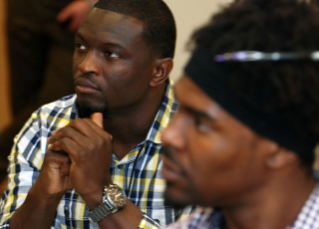 Walter Harris and Ramses Barden listen to Parry's presentation. Players later had an opportunity to write about the press conference.