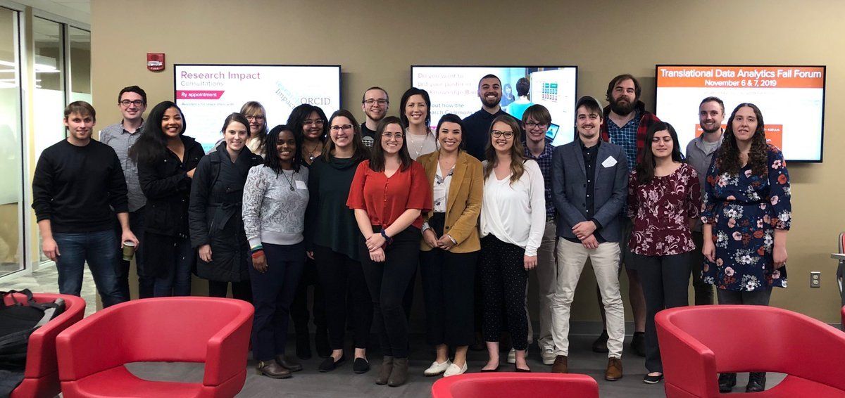 20 graduate students smile for the camera at the 13th annual OSU/BGSU student pop conference