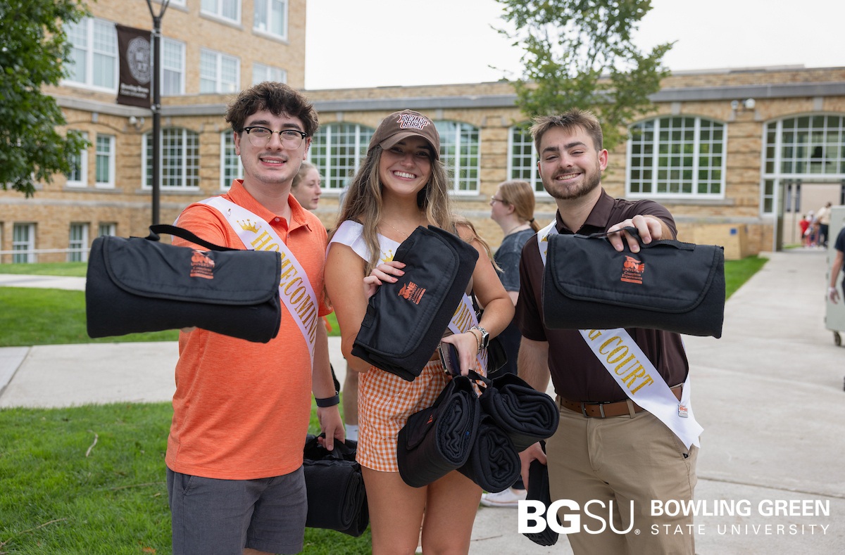 group of students passing out blankets