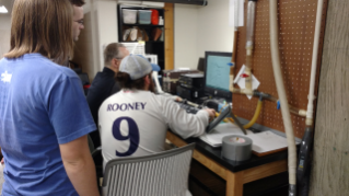 Dr. Scherer advising CDIS undergraduate student Sarah Pilkington and Physics graduate student Josh Mewhinney, M.S.