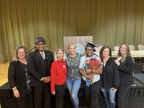  (Left to right) Tracy McGinley, Harold D'Souza, Dawn Anderson, Lara WIlken, Annette Mango, Heather Wilde, Carolyn Kinkoph