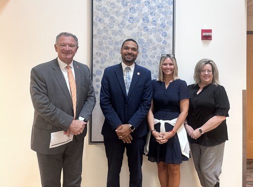 From left: BGSU President Rodney Rogers, Ohio House Rep. Josh Williams, and faculty members Lara Wilken and Tracy McGinley discuss the BGSU Labor Trafficking and Research Initiative.