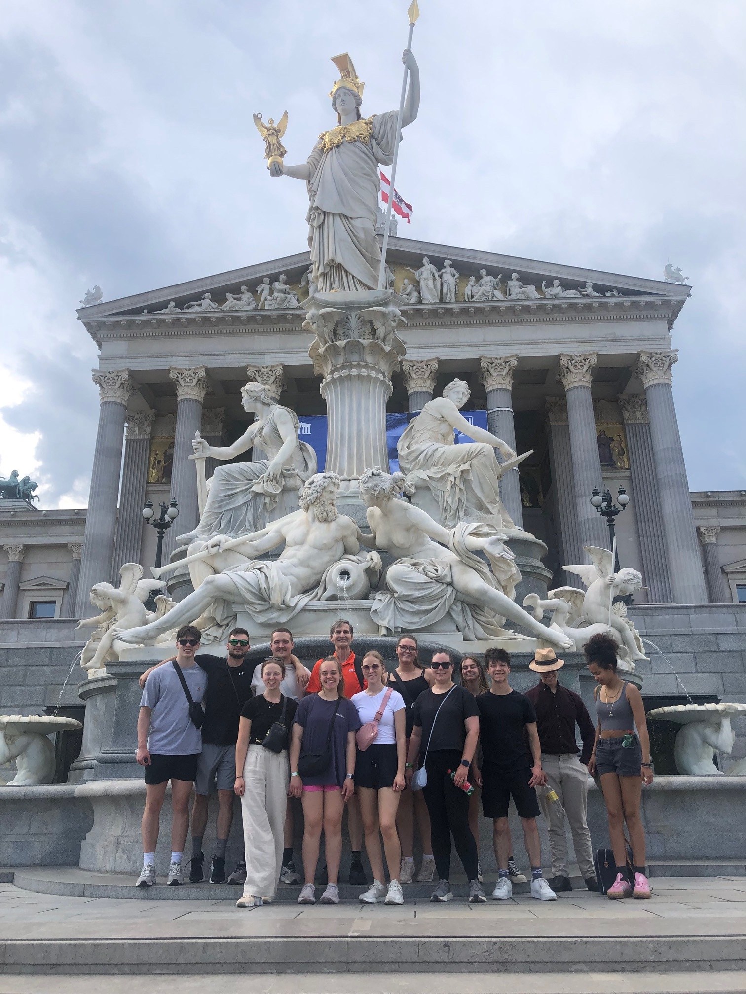 A group posed at the Austrian Parliament in Vienna