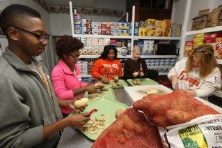 BGSU Firelands students volunteer at the Victory Kitchen in Sandusky, Ohio . BGSU Firelands community was commemorating the Martin Luther King Jr. holiday on Monday, January 19, 2015 by participating the in the national “Day-of-Service”. The Martin Luther King, Jr. Day of Service Challenge is an annual community service event that is open to all students, faculty, & staff at BGSU.  The event engages over 700 volunteers and more than 45 community partners.  In honor of Martin Luther King, Jr., volunteers serve on MLK, Jr. Day to make it “a day on, not a day off.”