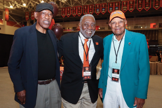 Inductee Chuck McCampbell ’59 with Benny Williams ’59, ‘61 and Crystal Ellis ’57, ’75, ’93 enjoy the Friday evening festivities