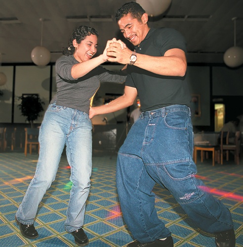 Two students dancing