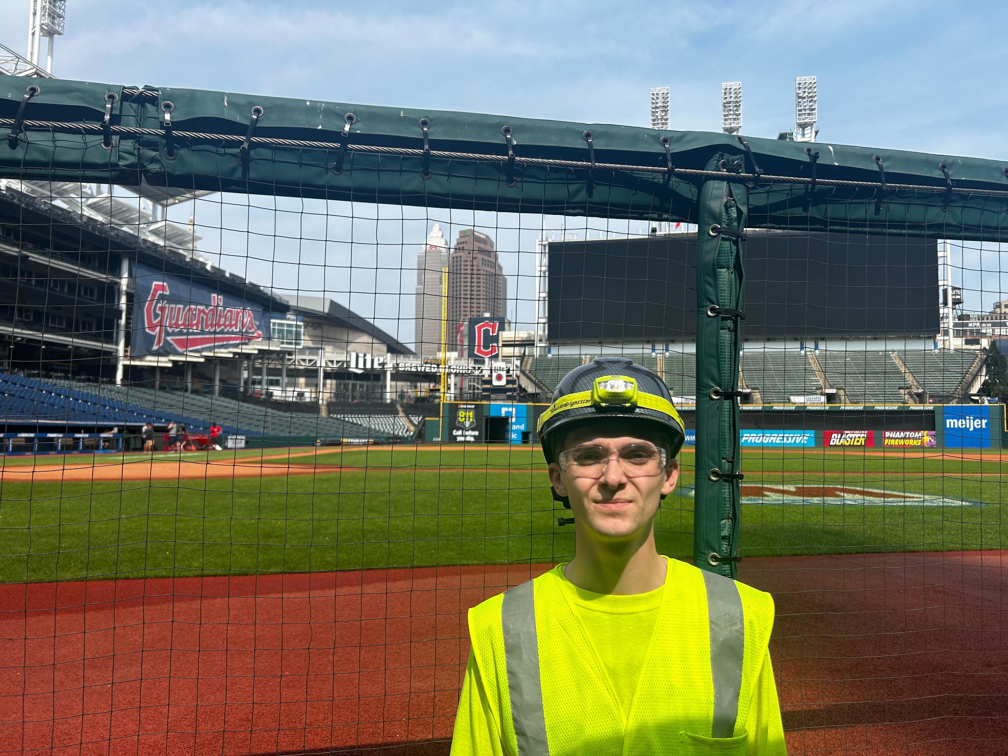 Daniel Multti standing in front of the Guardians' field.