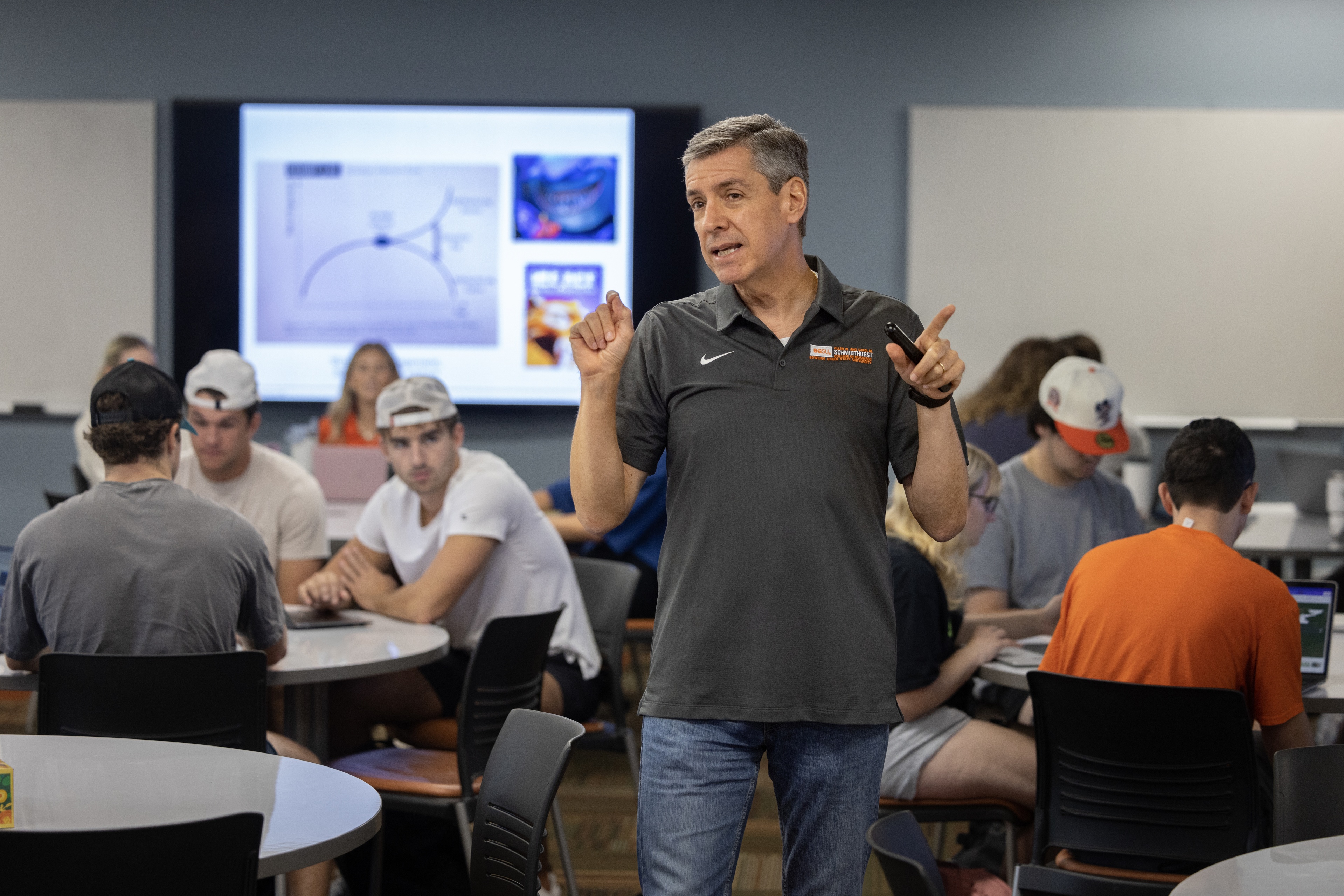 Professor teaches students in a classroom