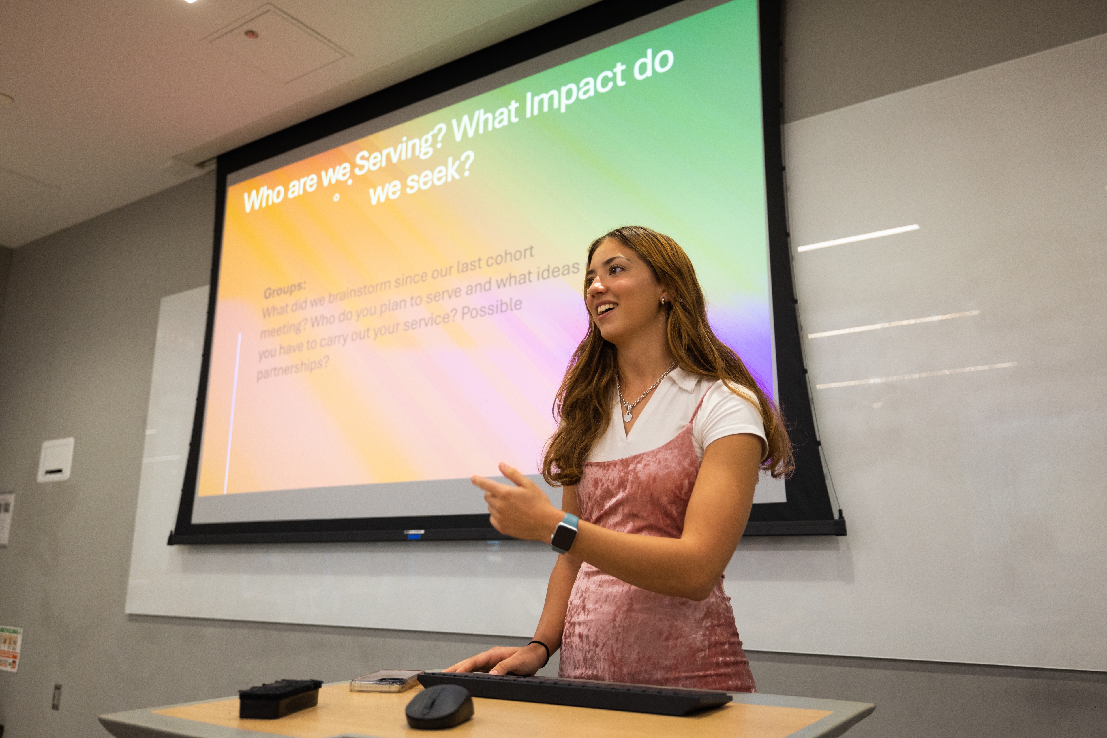 BGSU student Amelia Alexander leads a Millennium Fellowship curriculum session.