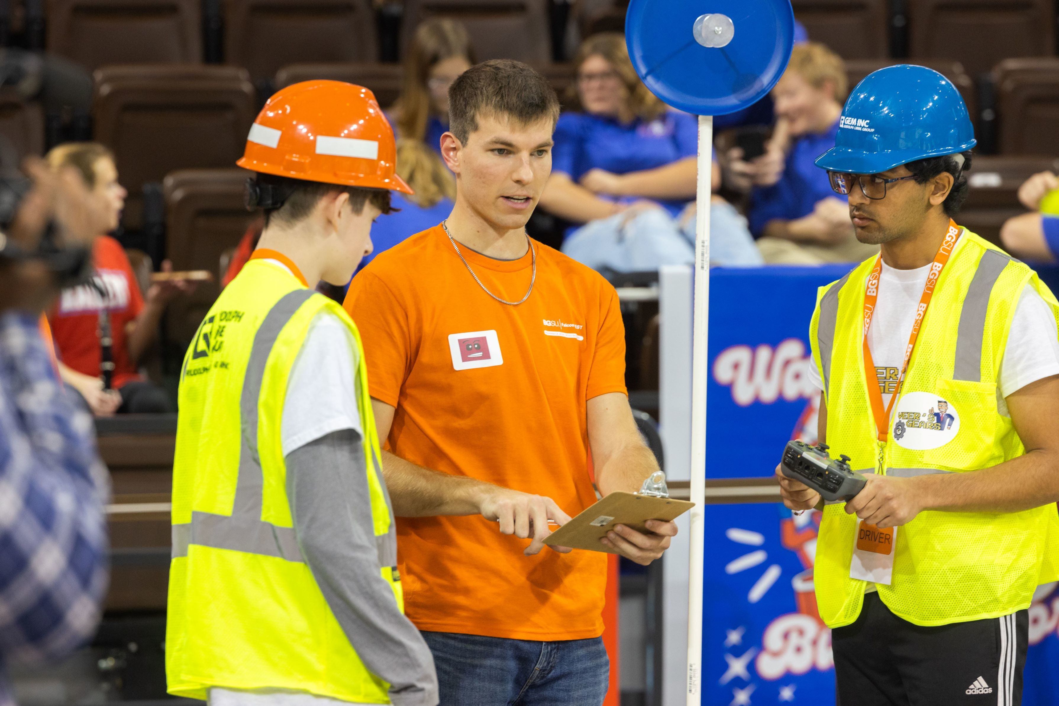 A BGSU engineering student talks with high schools students 