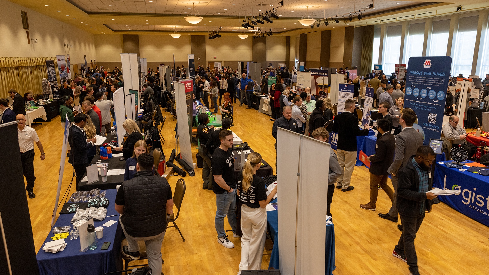 Students walk around a career fair