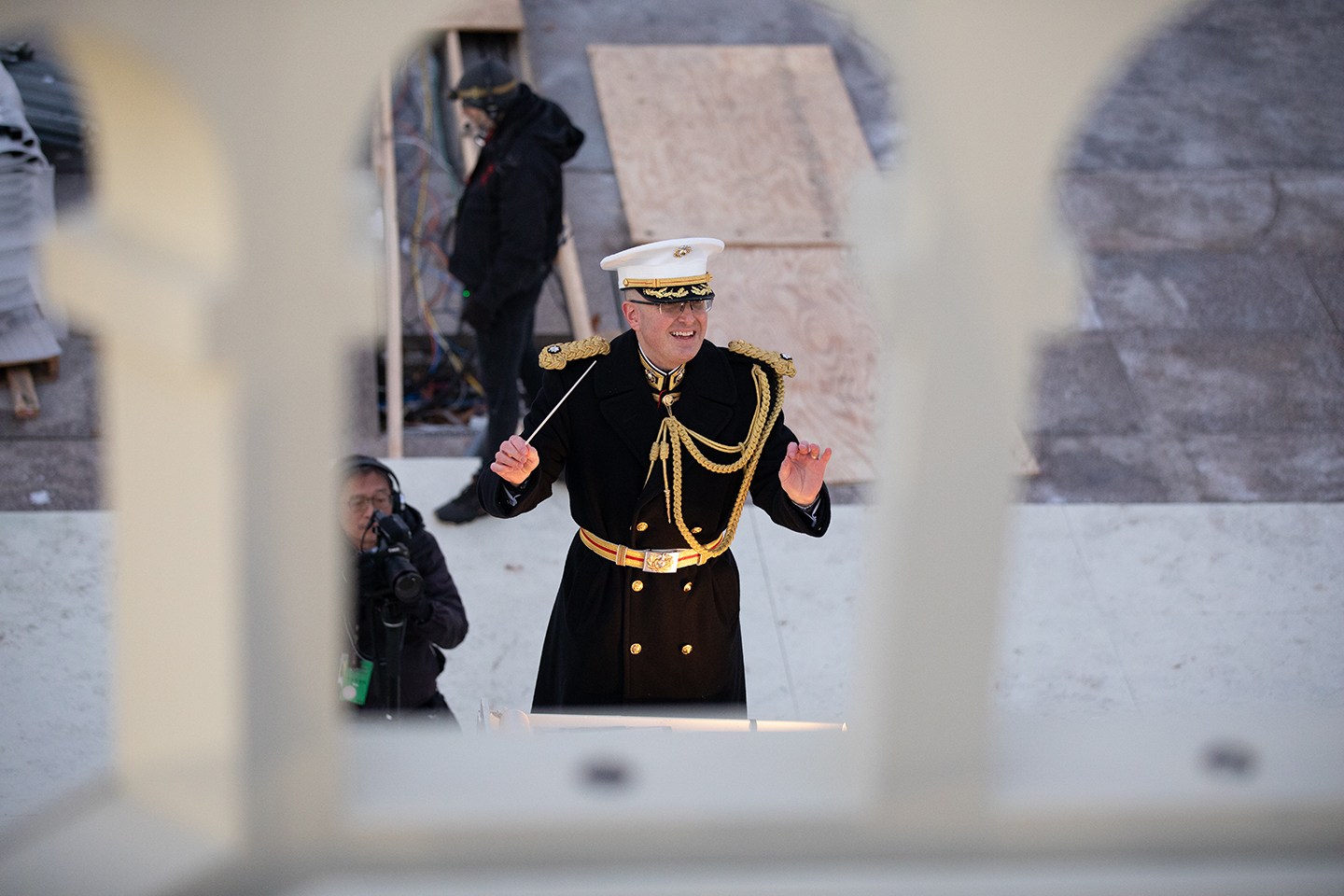 A band director leads a band during rehearsals.