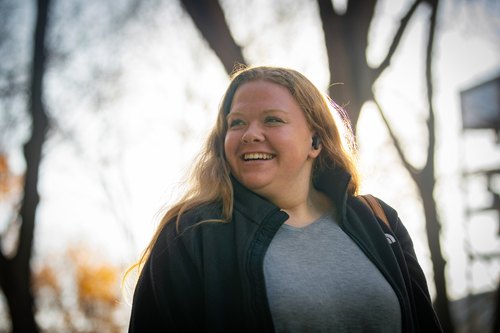 A student smiling