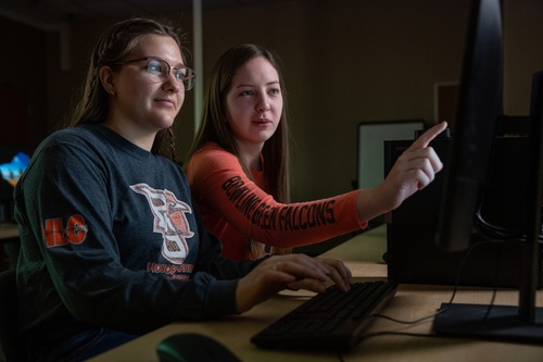 Two sudents in digital forensics lab 